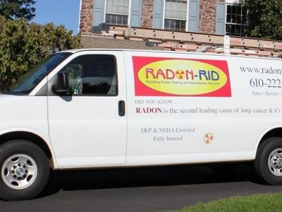 Radon-Rid Van in Front of a Home - Radon-Rid, LLC