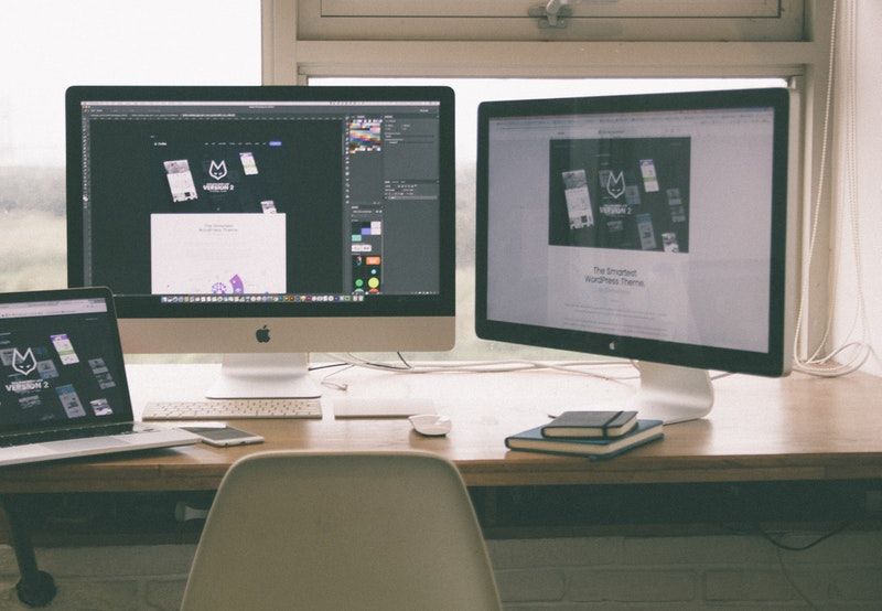 Desk with computers and laptop, update your website, VIEWS Digital Marketing