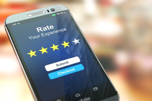 Smartphone or mobile phone with text rate your experience on the screen | online reputation management | VIEWS Digital Marketing