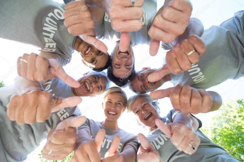 image of volunteers in a circle looking down with thumbs up - VIEWS Community Service