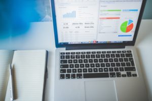 Laptop showing analytics | improve website conversion | VIEWS Digital Marketing