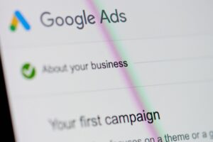 Google ads menu on device screen pixelated close up view | local paid search advertising | VIEWS Digital Marketing