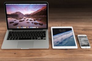 MacBook with tablet and iPhone | build an online presence | VIEWS Digital Marketing